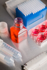 Cell culture media in laboratory for pipet.