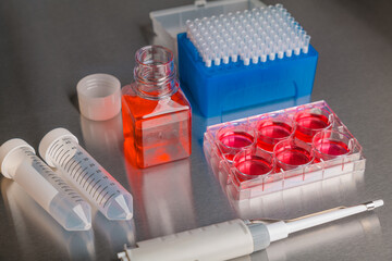 Cell culture media in laboratory for pipet.