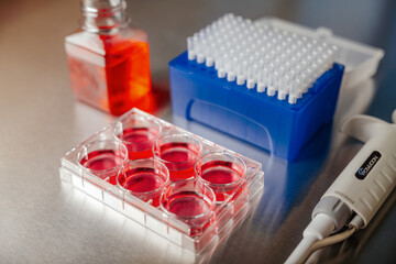 Cell culture media in laboratory for pipet.