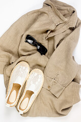 Set of seasonal summer fashion woman clothes, top view. Women's summer outfit.