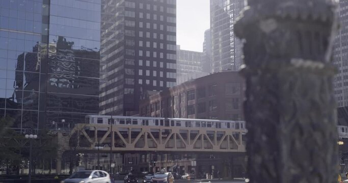 Urban city life in Chicago, cars and metro in modern town with skyscrapers 