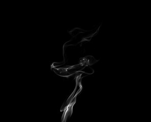 Obraz premium White smoke or steam smog moves on a black background. Beautiful gray smoke