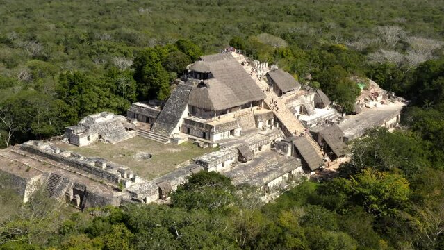 Ruins of ancient mayan Ek Balam city acropolis in mexican jungle.
