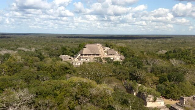 Stone temple pyramid of ancient Maya city Ek Balam in mexican jungle.