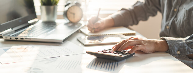 Tax deduction planning concept. Businessman calculating business balance prepare tax reduction.