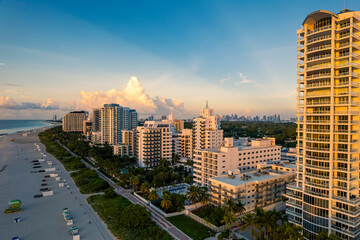 Fototapeta na wymiar Miami Beach, Florida, USA - Morning aerial view of luxury condominiums and hotels with the Miami skyline in the distance.