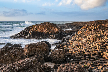 View of basalt columns coast at Giants Causeway in Northern Ireland. Copy space in sky.