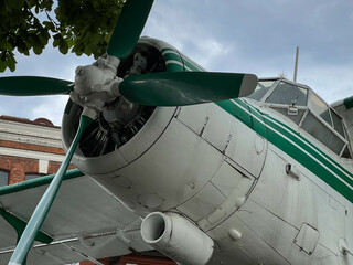 Propeller biplane aircraft type SP-ZEN - PZL-Mielec An-2 standing on the square in front of the...