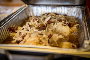 Chicharron with onions and Yuca