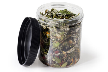 Herbal collection of dried medicinal plants in open plastic container