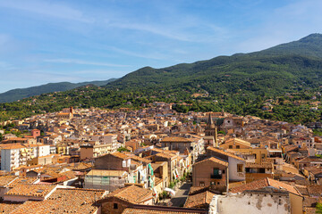 Fototapeta na wymiar High angel view of the small medieval town Castelbuono, Sicily. Madonie mountains. Summer time. August 2023.