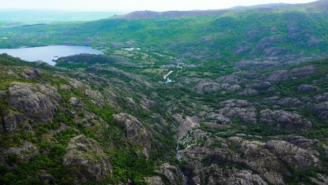 Ribadelago town in distance behind rio tera river lake and canyon