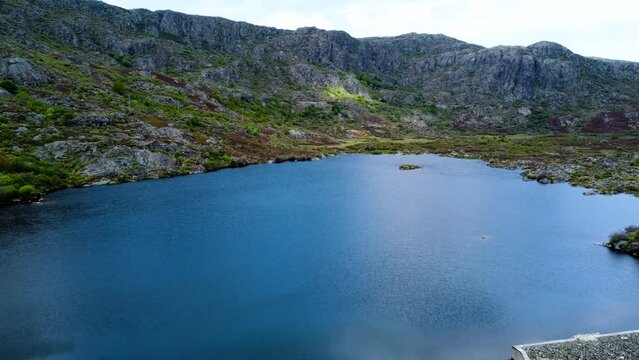 Rio tera canyon and dam lake at base of tall cliff mountains in zamora spain