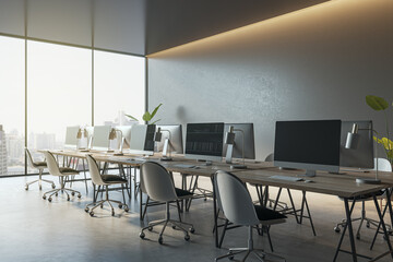 New coworking office interior with computer monitors, window and city view and furniture. 3D Rendering.