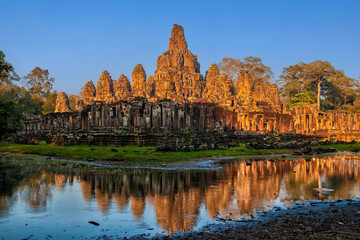 Fototapeta na wymiar Bayon Temple At Sunset In Cambodia