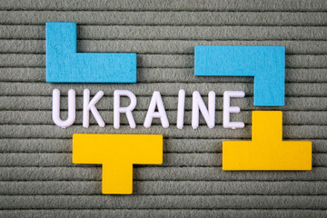 UKRAINE Concept. White letters of the alphabet on a green background