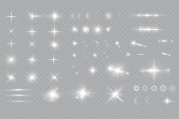 White sparkles.Bright star.Glow burst.Rays of the sun on a transparent background.