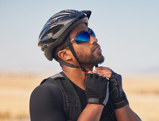 Cycling, sports and fitness with man and helmet in road for training, challenge and performance,...