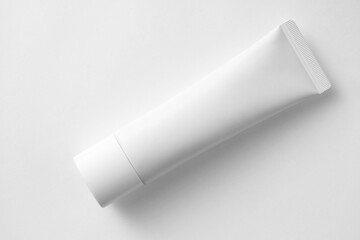 cosmetic white cream tube with white background