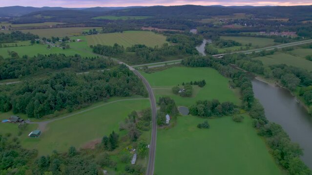 Nineveh, New York on the sides of the Susquehanna river. Drone aerial of the farms and historic home of Joseph Knight Sr.  And Mormon early history and colesville saints