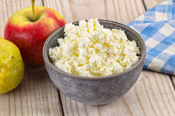 Organic cottage cheese in the bowl