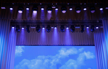 scene, stage light with colored spotlights and smoke