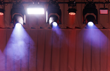 scene, stage light with colored spotlights and smoke