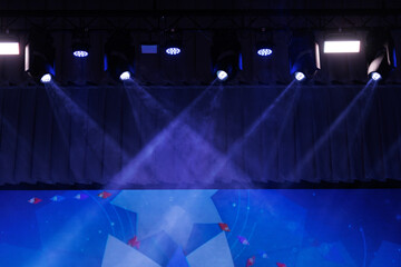 scene, stage light with colored spotlights and smoke