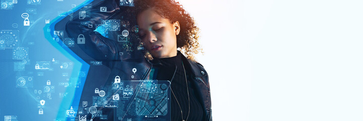 Young Black woman and digital technology concept. Wide angle visual for banners or advertisements.