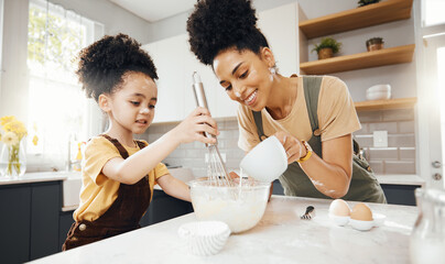 Child, mother and baking in kitchen, teaching and learning with support, development and breakfast. Cupcake, cooking and boy chef helping happy mom, mixing bowl for milk and eggs recipe in morning. © Wesley/peopleimages.com