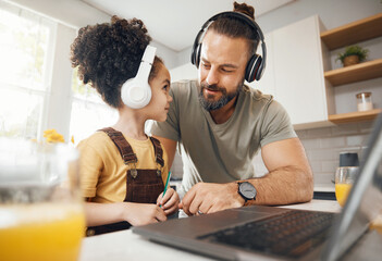 Father, child and headphones on laptop for home education, e learning support and helping with...