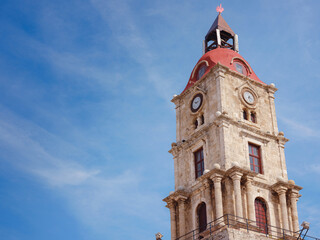 Fototapeta premium Medieval Roloi Clock Tower, Old Town of Rhodes, Rhodes, Greece, travel to famous place