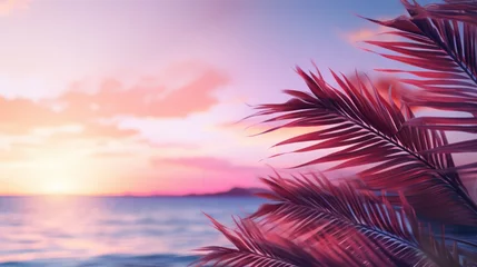 Foto op Canvas Close up of palm leaves with sunset sea in soft tones. Beautiful nature background. © ant