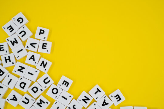 Scrabble game letters yellow background. Ankara, Turkey - August 25, 2023.