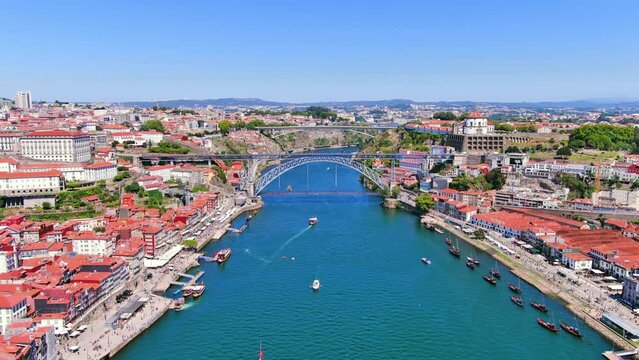 Porto, Portugal: Aerial view of famous historic European city, center with iconic Luís I Bridge (Ponte Luís I) over Douro river, Ribeira district - landscape panorama of Southern Europe from above