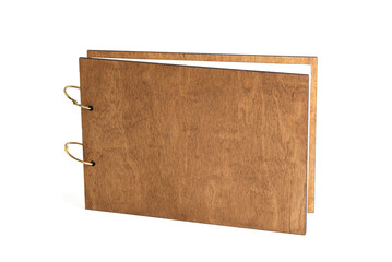 Wood hardcover photo book isolated on a white background. Promoting printing photos from photoshoot.