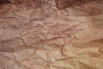 Texture of crumpled parchment paper as background, top view