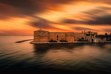 Taranto's Aragonese Castle at sunset, long exposure