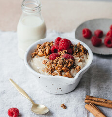 Muesli with raspberries and porridge oat for breakfast