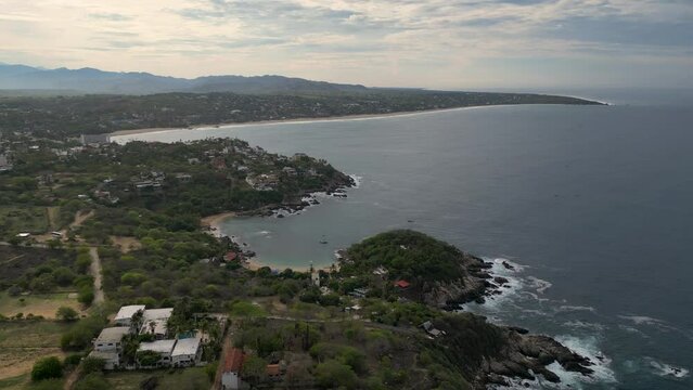 Aerial view's Puerto Angelito, Manzanillo and Zicatela Beaches at Puerto Escondido, Oaxaca, Mexico