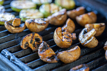 Background of fried vegetables on the grill close-up.Healthy food concept, vegan food.
