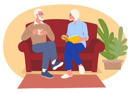 Elderly couple comfortably engaged in a sofa conversation. Scene of togetherness, communication, and lifelong connection