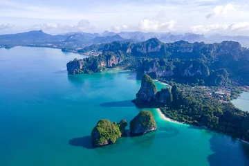 Papier Peint photo autocollant Railay Beach, Krabi, Thaïlande Railay Beach Krabi Thailand, the tropical beach of Railay Krabi, view from a drone of idyllic Railay Beach in Thailand in the evening at sunset with a cloudy sky