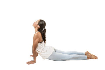 woman practicing yoga cobra pose or bhujangasana