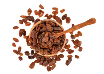 Top view of sweet raisins on a spoon and in a bowl over white background.