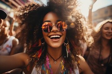 Cheerful brazilian woman laughing and dancing in the street. Brazil Carnaval festival and people in costume celebrating.