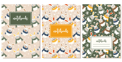 set of notebook covers with cozy winter illustrations with bunnies in scarves and snowflakes in flat style with simple shapes
