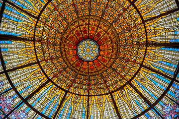 Palau de la Música Catalania:Barcelona, ​​Spain -JUNE 20 ,2023: Stained glass roofs in Palau...