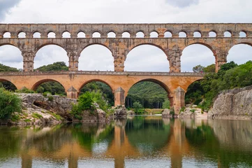 Keuken foto achterwand Pont du Gard Panoramic view of ancient old Roman Aqueduct Pont du Gard ear Vers-Pon-du-Gard, Occitanie, France, Europe. Landmark over the River Gardon. Unesco world heritage site near Nimes, Languedoc-Roussillon