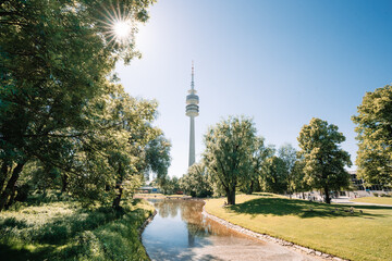View of Olympia Park with Olympia Tower Olympiaturm in Munich, Bavaria Germany - obrazy, fototapety, plakaty